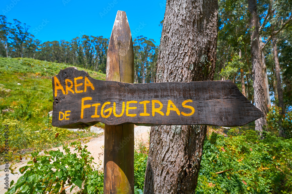 Photo &amp; Art Print Figueiras nudist beach road sign in Islas Cies island, lunamarina