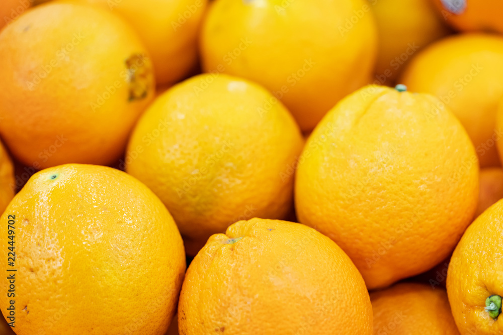 Oranges are fruit that has rich in vitamins and an acid taste. They are displaying on stall to sell to somebody, and looks very fresh. Oranges are fruit that has rich in vitamins and an acid taste. They are displaying on stall to sell to somebody, and looks very fresh.