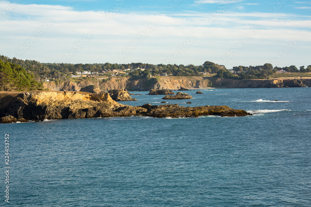 Town, cliffs, and ocean in Mendocino, California