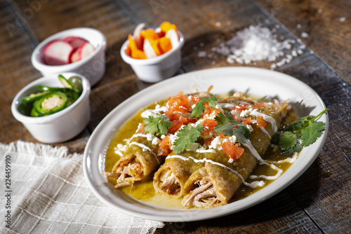 Plate of Mexican Green Enchiladas photo