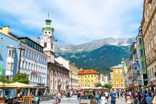 INNSBRUCK, AUSTRIA - AUGUST 29, 2019: Innsbruck town center with lots of people and street cafes in Innsbruck, Tyrol, Austria