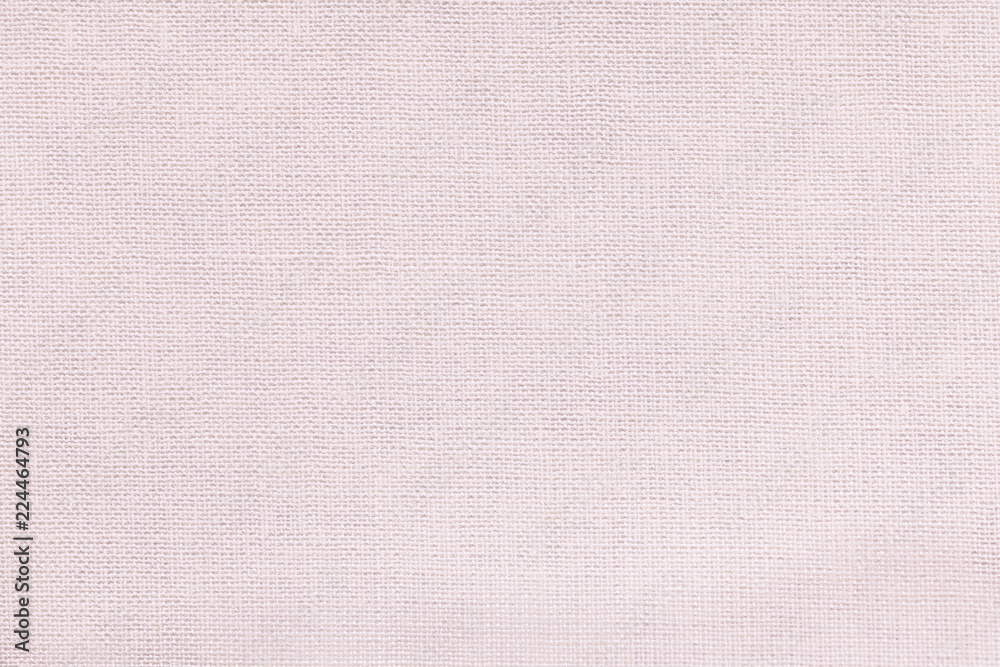 Fototapeta premium White background from a textile material with wicker pattern, closeup.