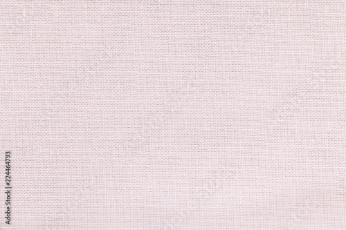 White background from a textile material with wicker pattern, closeup.