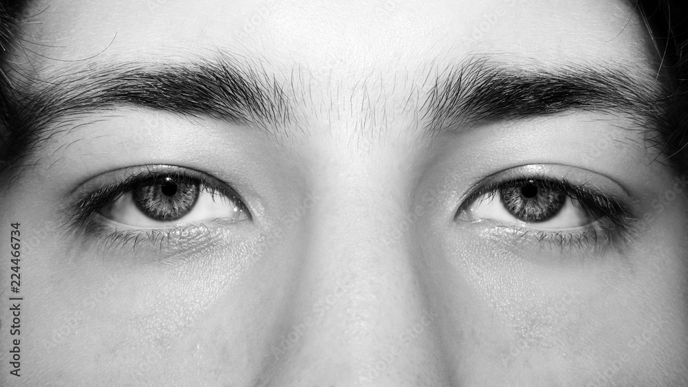 A beautiful insightful look man's eye. Close up shot. A beautiful insightful look man's eye. Close up shot.