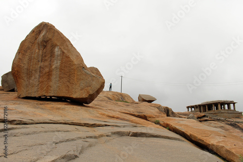 The rocky mountains and hills (and transformers) surrounding temples in Hampi photo