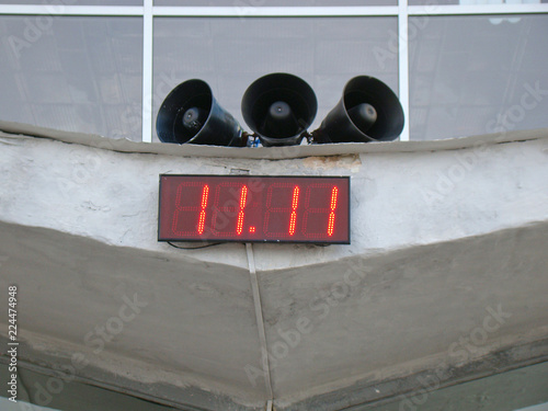 Wallpaper Mural Electronic clock, speaker, date Torontodigital.ca