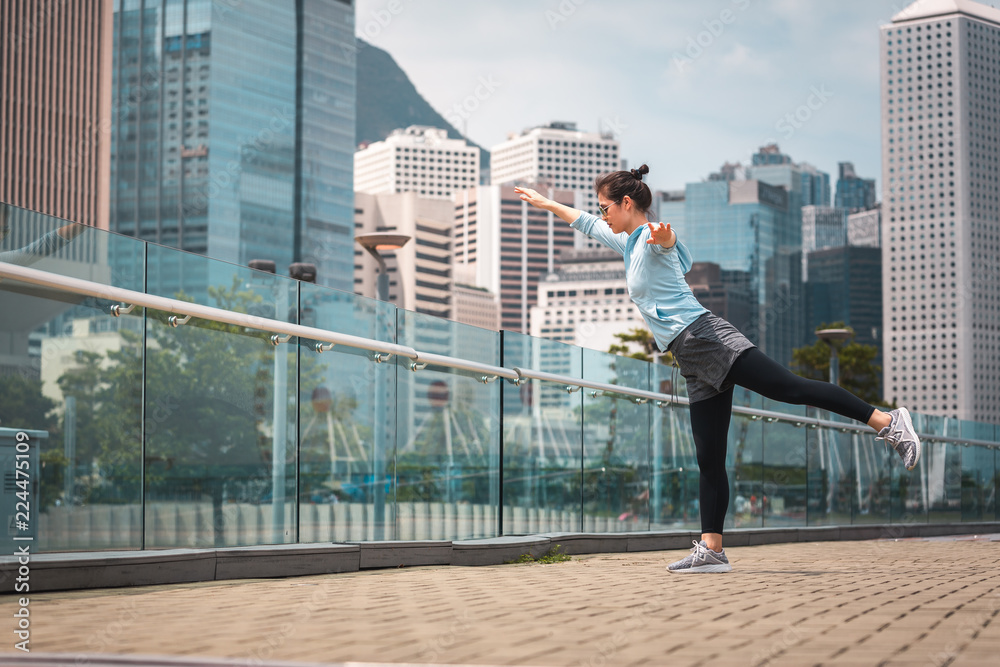 Woman doing workout in Hong Kong Woman doing workout in Hong Kong