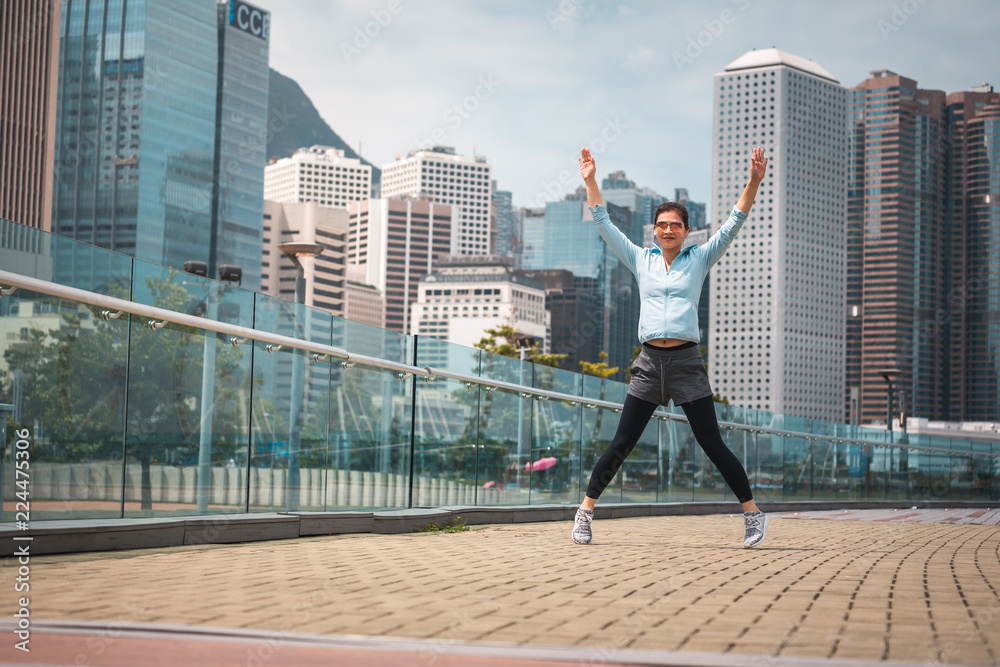 Urban woman doing workout in the city Urban woman doing workout in the city