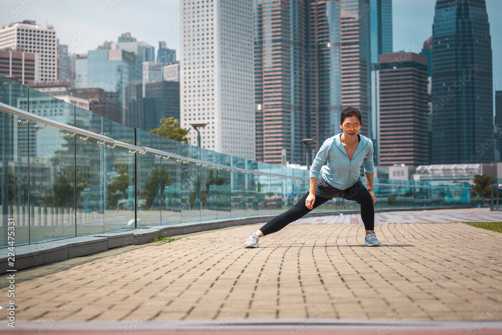 Urban woman doing workout in the city Urban woman doing workout in the city