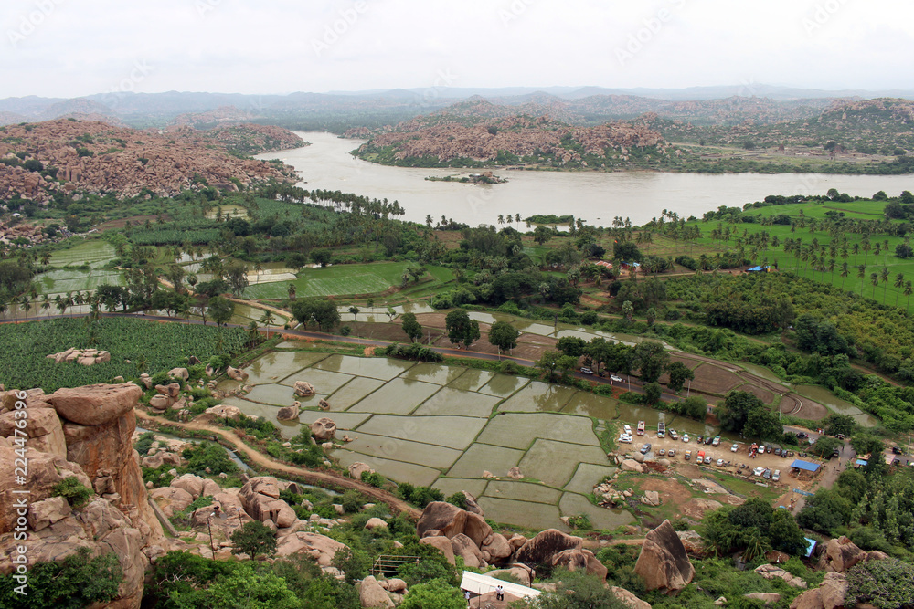 The landscape view or scenery of Hampi, viewed from Anjana mountain (Hanuman Temple) in Anegundi