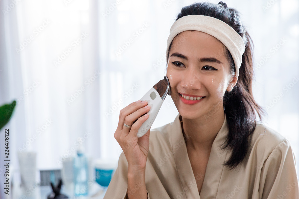 woman doing skin treatment her self woman doing skin treatment her self