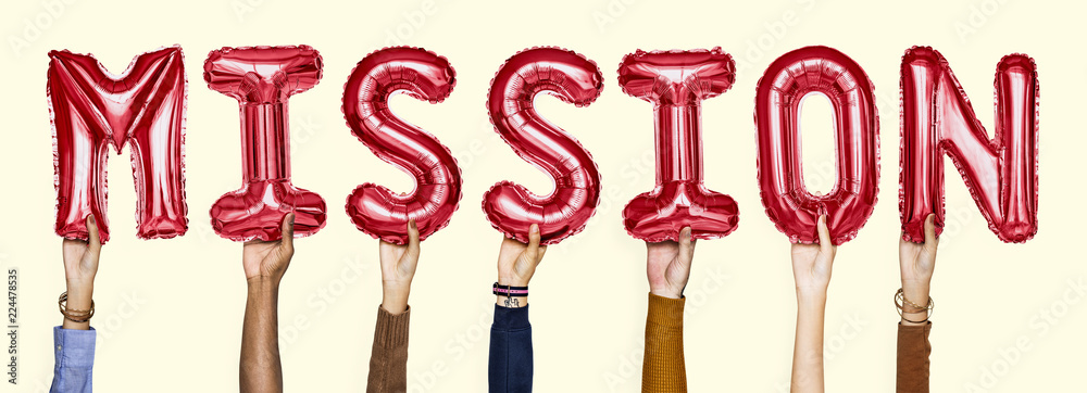 Red alphabet helium balloons forming the text mission Red alphabet helium balloons forming the text mission