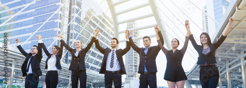Photography business people group partnership joining hands up and representing friendship a
