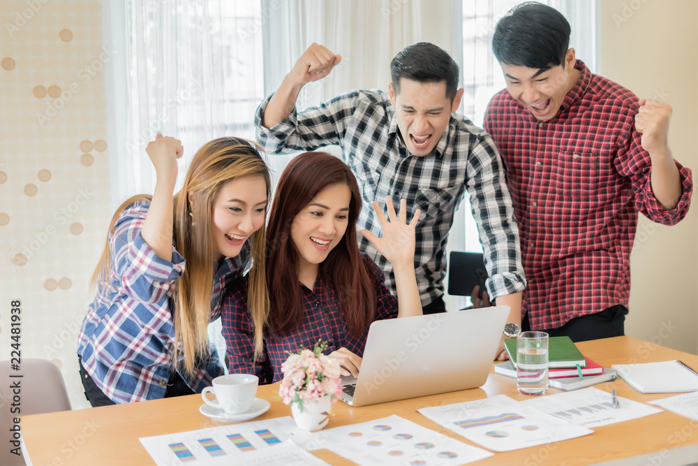 Creative Asian man and women in modern office.business people are working together with laptop, tablet, smart phone, notebook, Cheerful business team . Successful teamwork in coworking, Freelancers. Creative Asian man and women in modern office.business people are working together with laptop, tablet, smart phone, notebook, Cheerful business team . Successful teamwork in coworking, Freelancers.