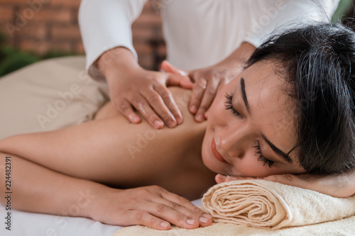 asian young girl having massage