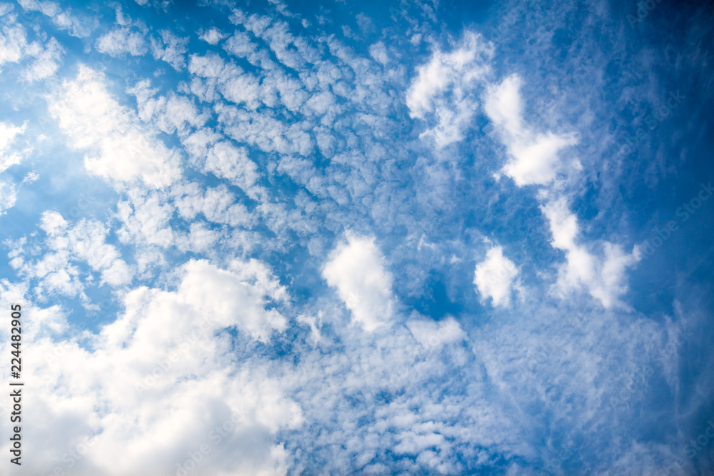 Blue sky with clouds background.Sky daylight. Natural sky composition. Element of design. Blue sky with clouds background.Sky daylight. Natural sky composition. Element of design.