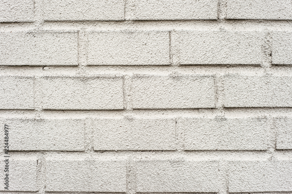 Obraz premium rough White painted brick wall for a background