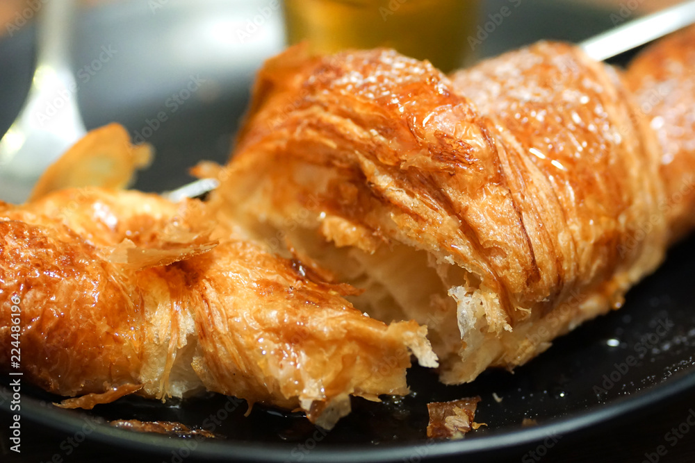 croissants with honey on plate close yummy croissants with honey on plate close yummy