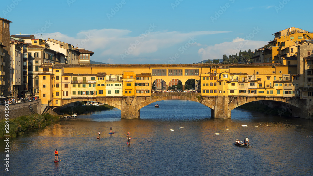Florence, Tuscany, Italy — 21 June 2018. View of Arno river and Ponte Vecchio bridge