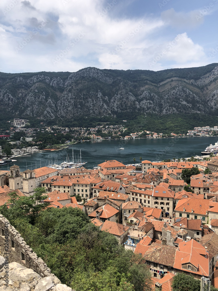 view of boats and yachts at the pier in the Bay of Kotor, Montenegro