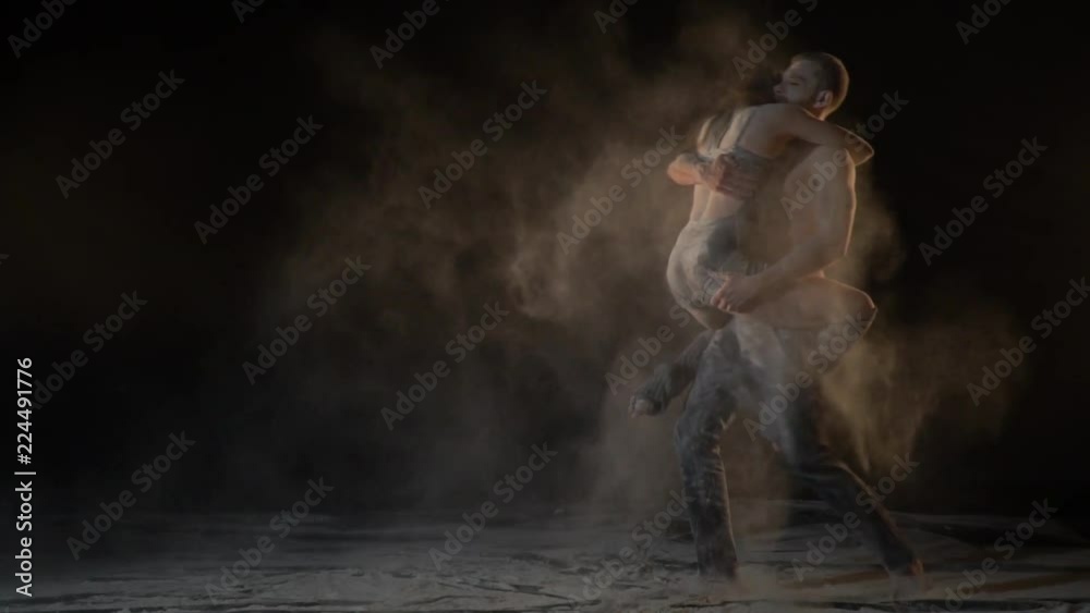 A woman runs to the man and jumps in his arms