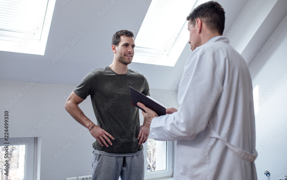 Patient Talking With His Physician