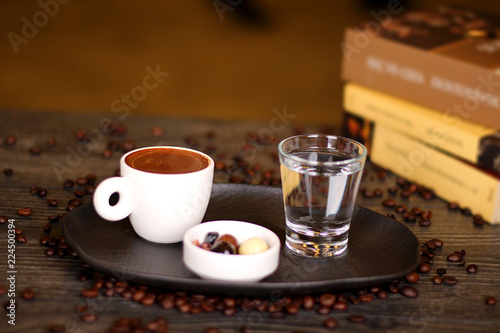 Leaf coffee with water and chocolate while studying in a quiet night