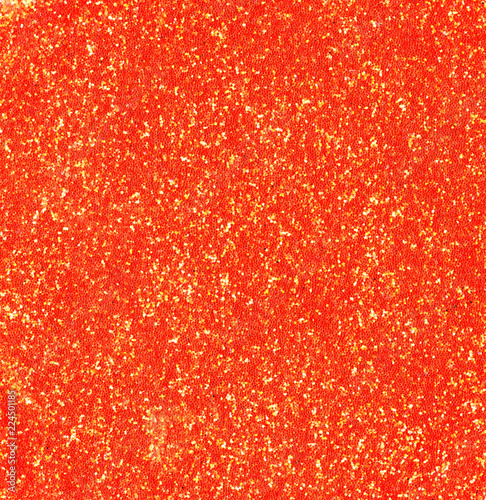 Red orange gold glitter background sparkling shiny wrapping paper texture for Christmas holiday seasonal wallpaper decoration, Valentines greeting and wedding invitation card design sequins element.