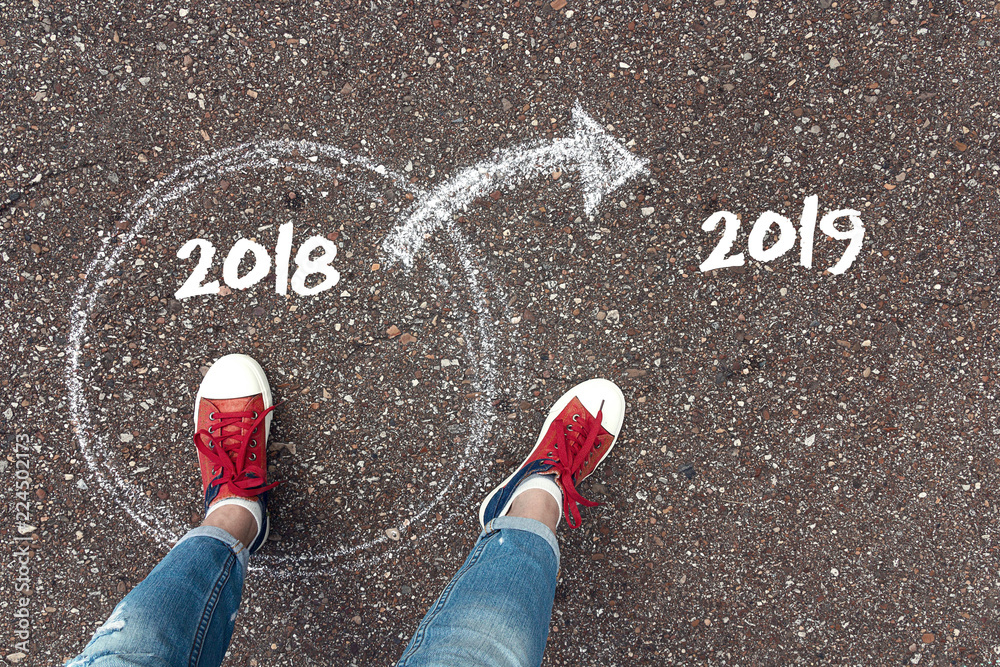 Start new year 2019 and leaving behind old year. Concept for success and passing time. Start new year 2019 and leaving behind old year. Concept for success and passing time.