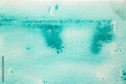 Green color abstract art background. Acrylic dye on canvas. Soft brushstrokes of paint. 