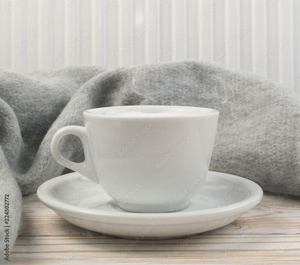 Mockup with white cup of coffee and steam Mockup with white cup of coffee and steam