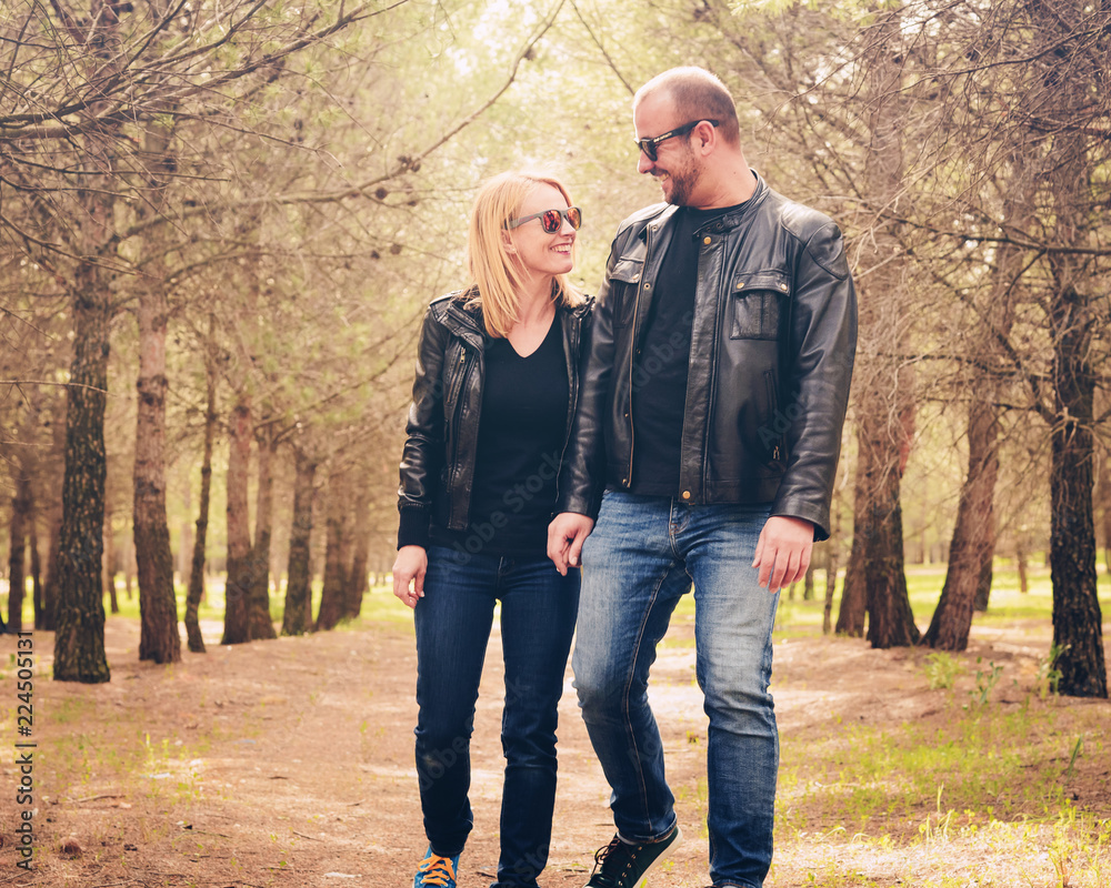 Cute Couple walking on the field Cute Couple walking on the field