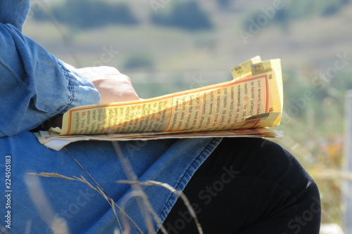 photo of girl studying prayer