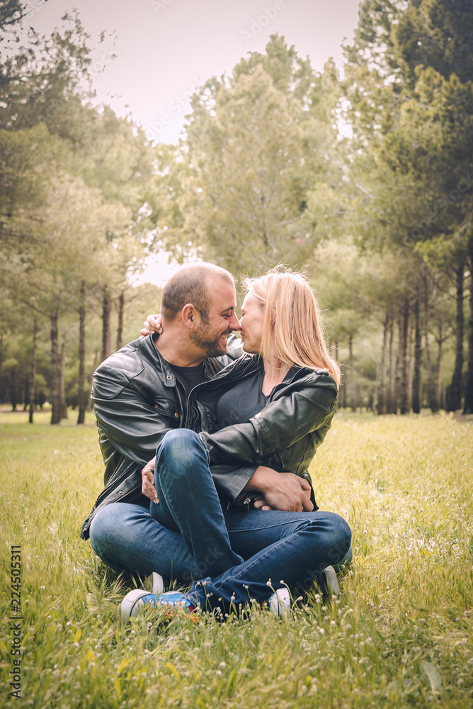Cute Couple kissing in the field Cute Couple kissing in the field