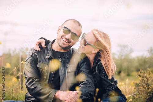 Cute Couple kissing in the field