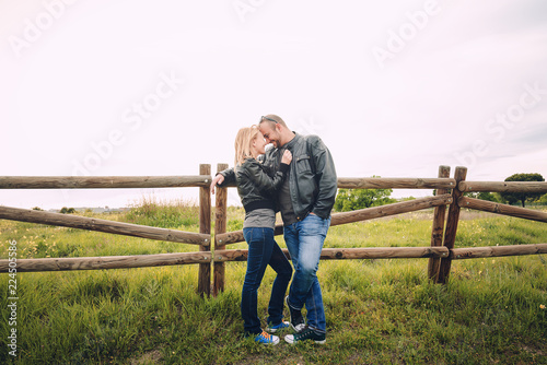 Cute Couple kissing in the field