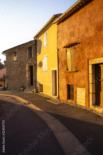 street and colourful houses of the Provence beamed by morning light, village Sainte-Croix-du-Verdon, department Alpes-de-Haute-Provence, region Provence-Alpes-Côte d’Azur