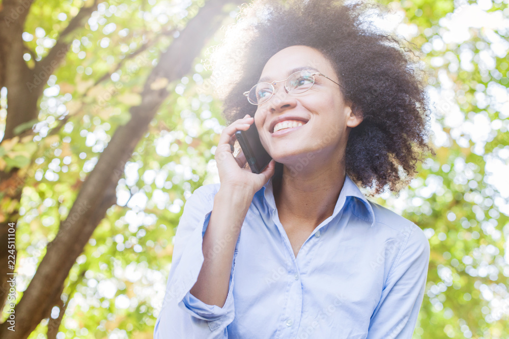 Beautiful Young Black Woman Speaking By Phone Beautiful Young Black Woman Speaking By Phone
