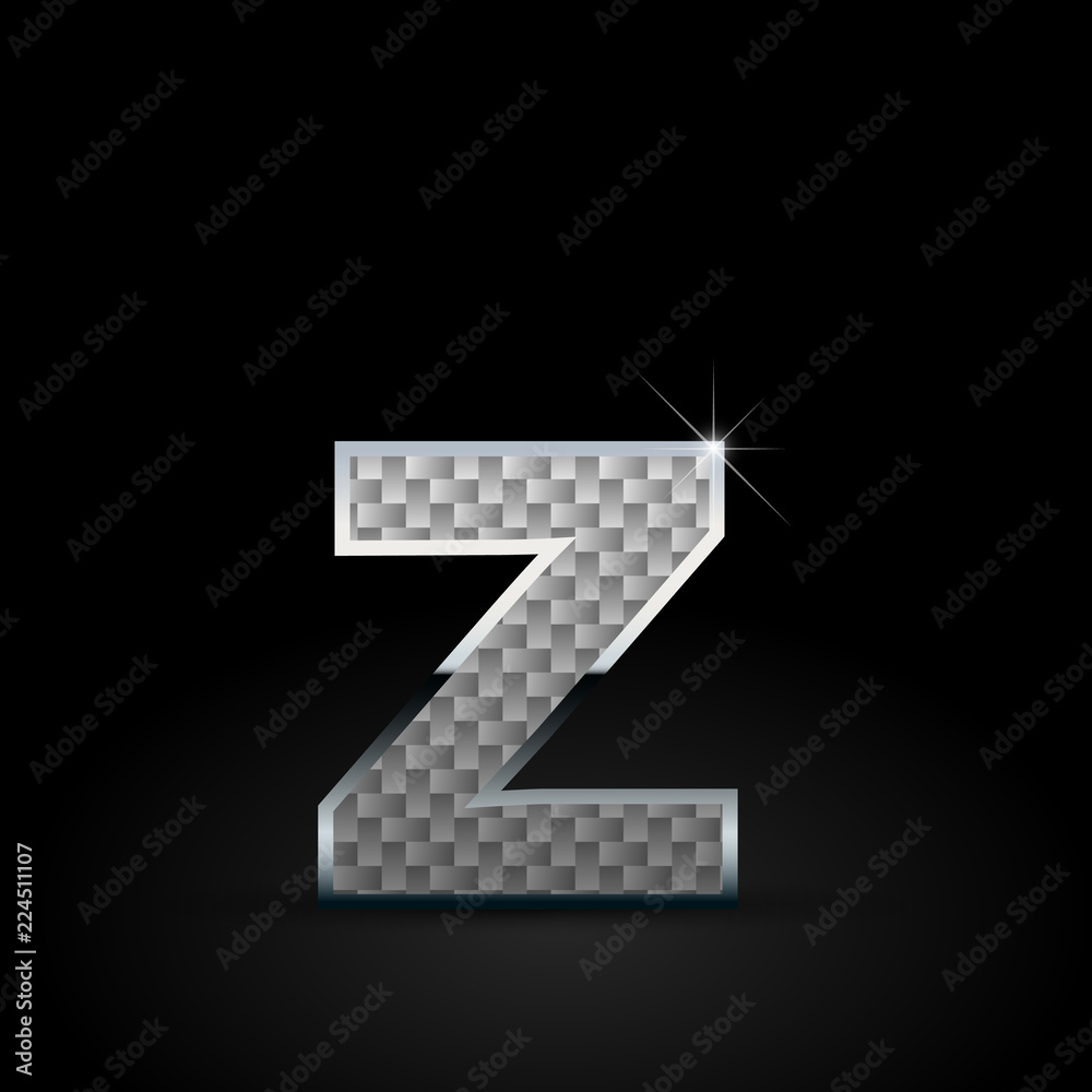 White carbon fiber letter Z lowercase with chrome outline isolated on black background White carbon fiber letter Z lowercase with chrome outline isolated on black background