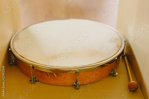 Leather tambourine to teach music at school.