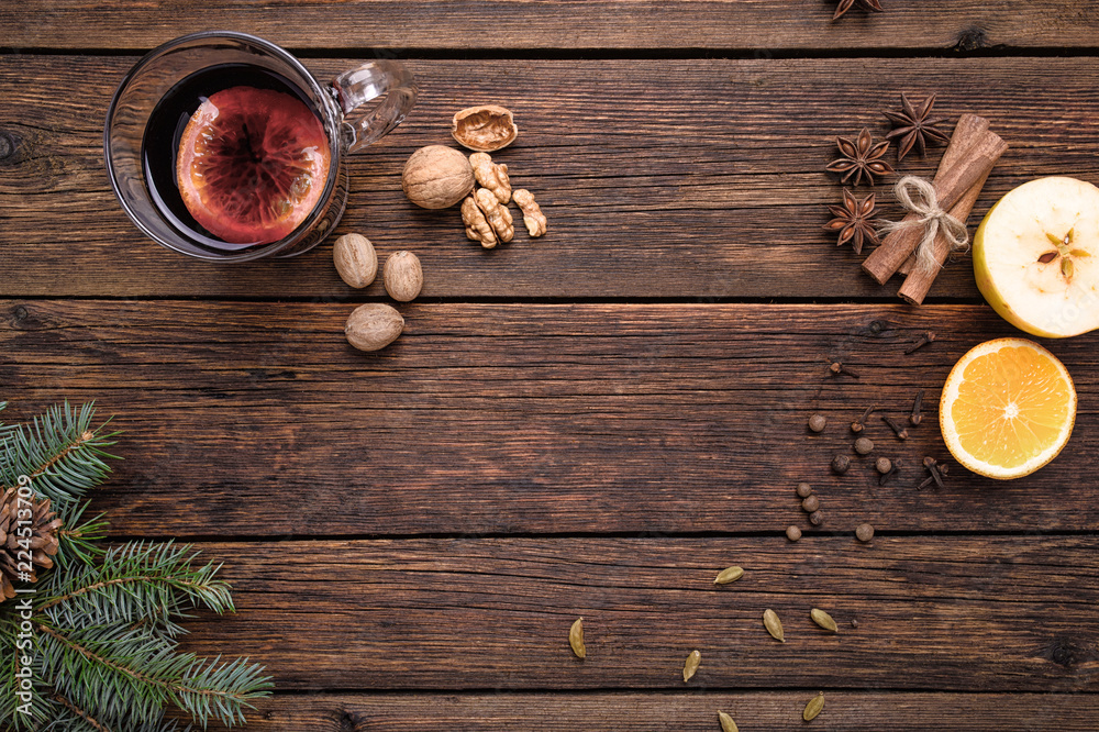 Mulled wine, punch and spices for glintwine on vintage wooden table background Mulled wine, punch and spices for glintwine on vintage wooden table background