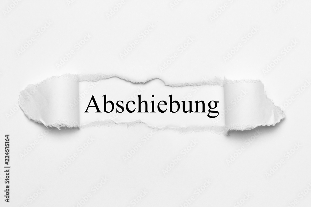 Abschiebung auf weißen gerissenen Papier Abschiebung auf weißen gerissenen Papier