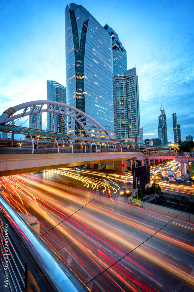 Obraz premium Bangkok,Thailand, - 24 July 2016 : Night time at Chong Nonsi skywalk Bangkok skytrain station (BTS) in Bangkok, Thailand. Chong Nonsi Station is a skytrain station at Bang Rak District. 