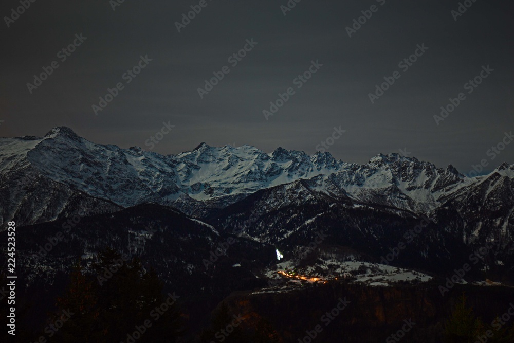 Panoramic view of Swiss Alps at moon light. Panoramic view of Swiss Alps at moon light.