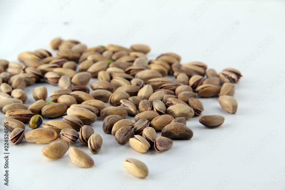 pile of pumpkin seeds isolated on white background