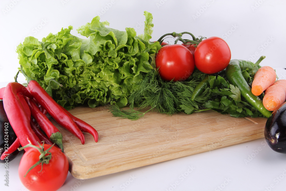 fresh vegetables on a cutting board fresh vegetables on a cutting board