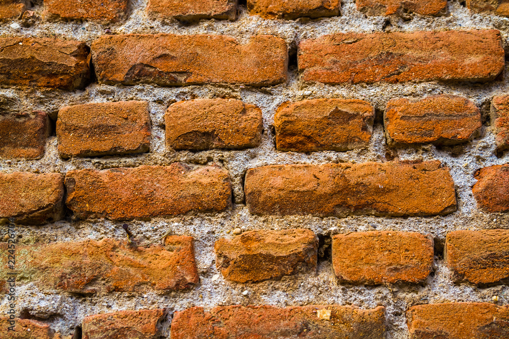 Old Dirty Red Brick Wall as Texture and Background