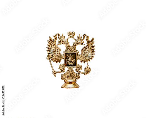 Cast bronze Russian coat of arms isolated on a white background. Russian State Emblem - a double headed eagle.