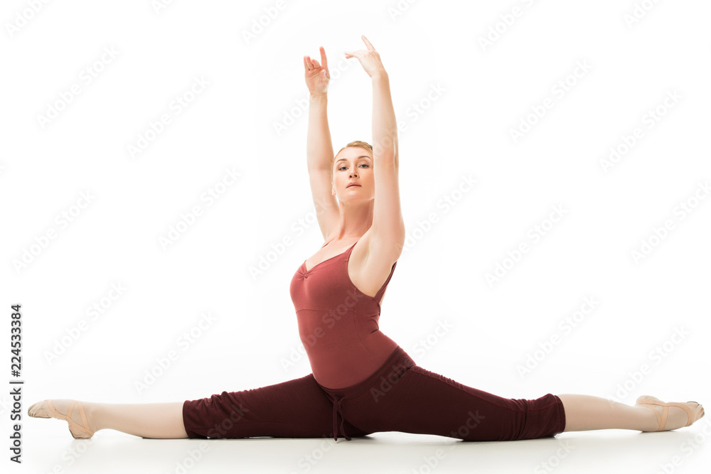 adult elegant ballerina exercising and doing twine isolated on white background adult elegant ballerina exercising and doing twine isolated on white background