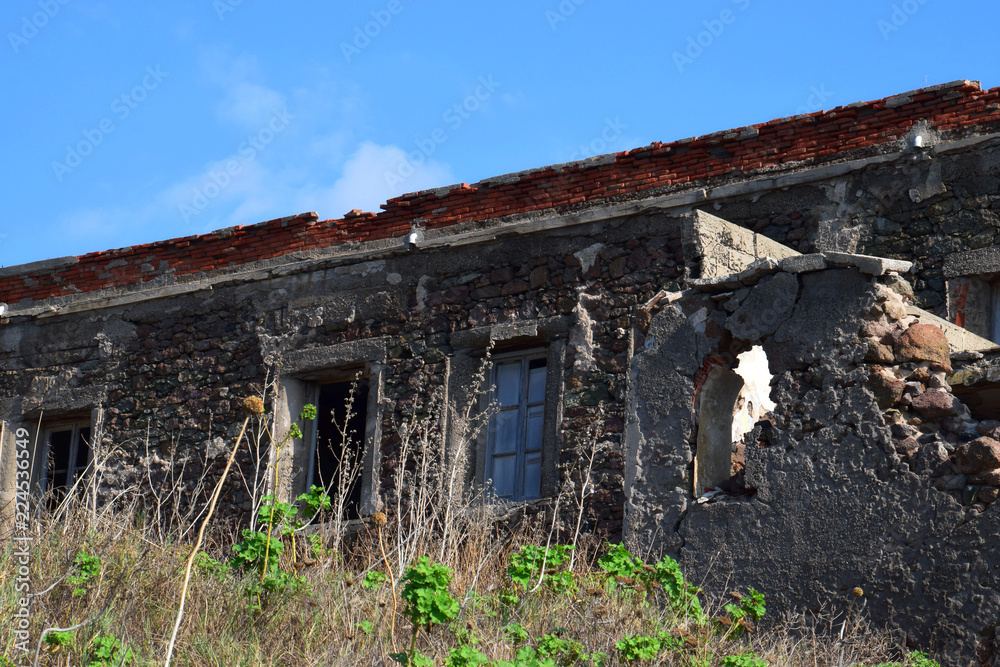 abandoned and dilapidated house with crumbled mortar in italy, Old abandoned house in mediterranan, lost place in front of azure sky abandoned and dilapidated house with crumbled mortar in italy, Old abandoned house in mediterranan, lost place in front of azure sky